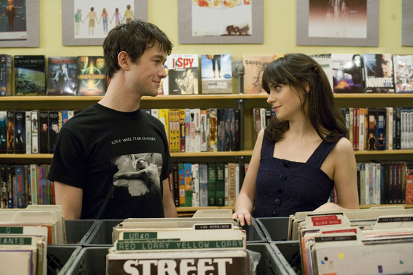 man and woman at a record store