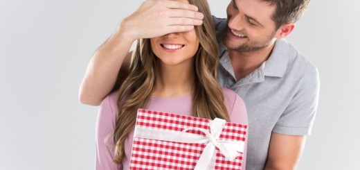 man giving a gift to a woman