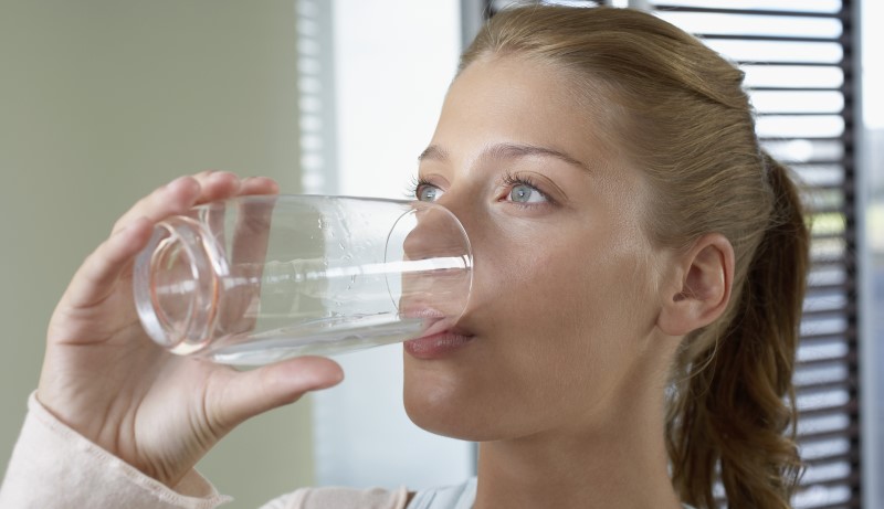 woman drinking water_New_Love_Times