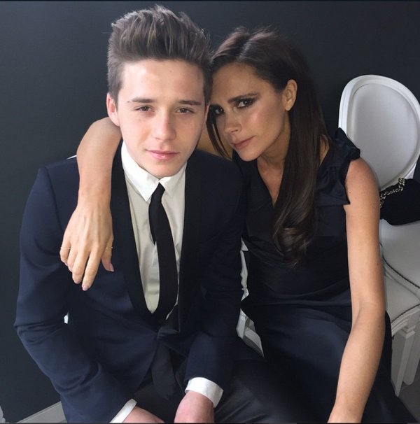 brooklyn beckham with his mother victoria at elton john's wedding