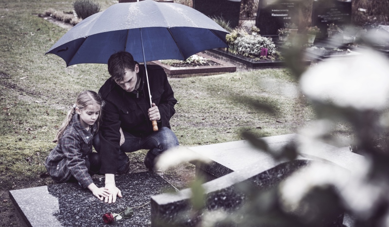 father and daughter visiting a grave_New_Love_Times