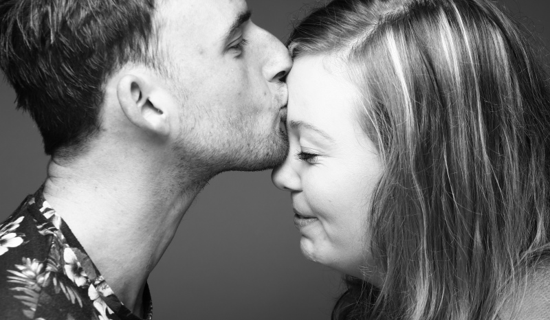 man kissing a woman's forehead (2)