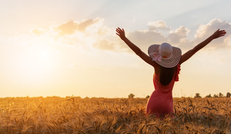 woman with her arms raised_New_Love_Times