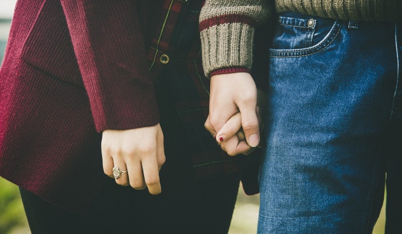 couple holding hands_New_Love_Times