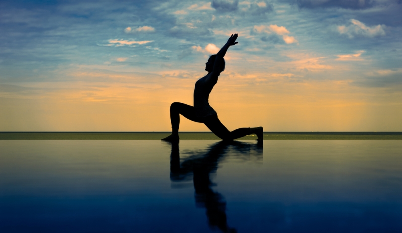 woman practicing yoga