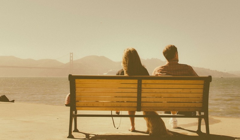 couple sitting on a bench_New_Love_Times