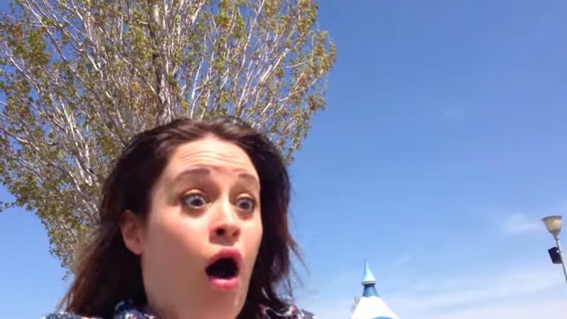 lisa may's surprised face as her fiance goes down on one knee