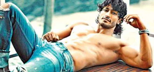 vidyut jamwal lounging and showing off his chiselled abs