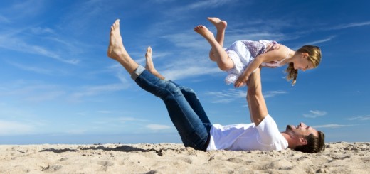 father playing with daughter