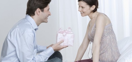man giving a gift to a woman_New_Love_Times