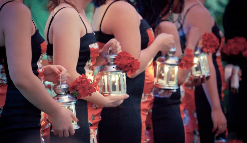 bridesmaids carrying lanterns