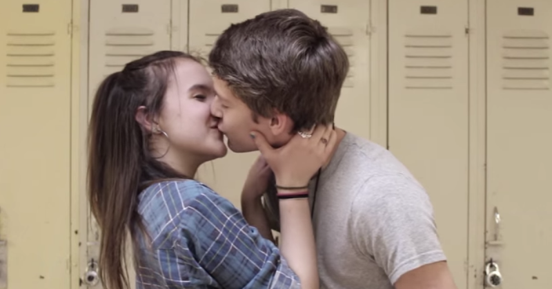teenagers kissing