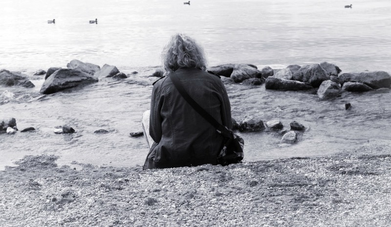 woman sitting alone_New_Love_Times