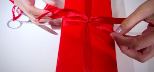 woman wrapping a present