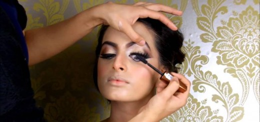 woman applying mascara