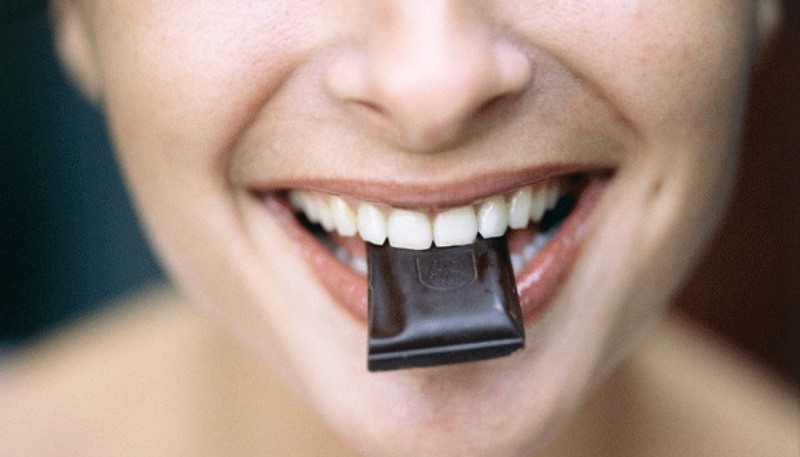 woman eating chocolate_New_Love_Times