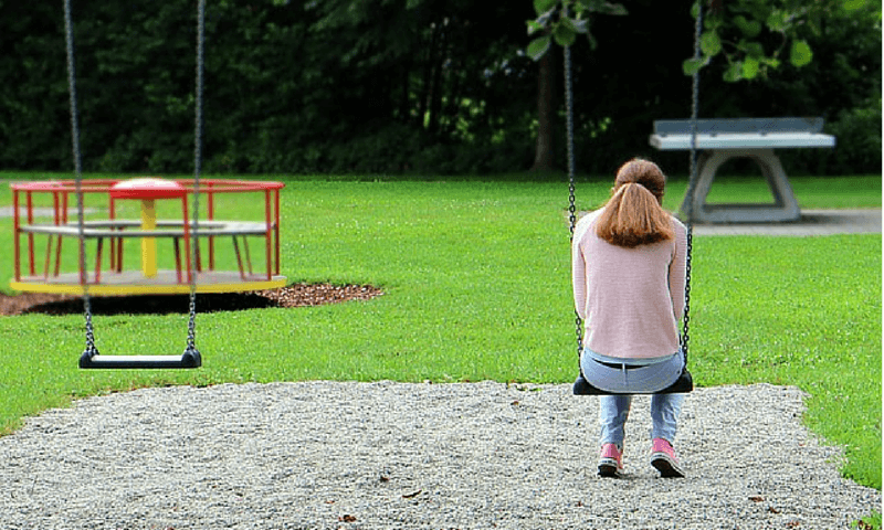 woman sitting alone