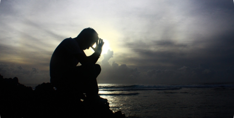 man praying_New_Love_Times