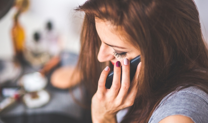 woman talking on phone_New_Love_Times