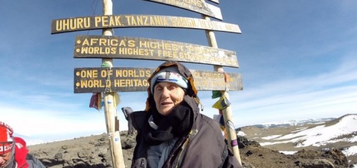 anne lorimor at the summit of mt. kilimanjaro