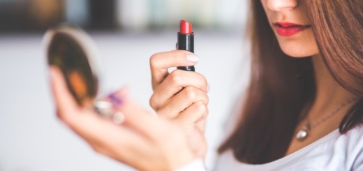 woman applying lipstick_New_Love_Times