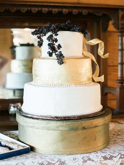 White and gold with blueberry sprigs 