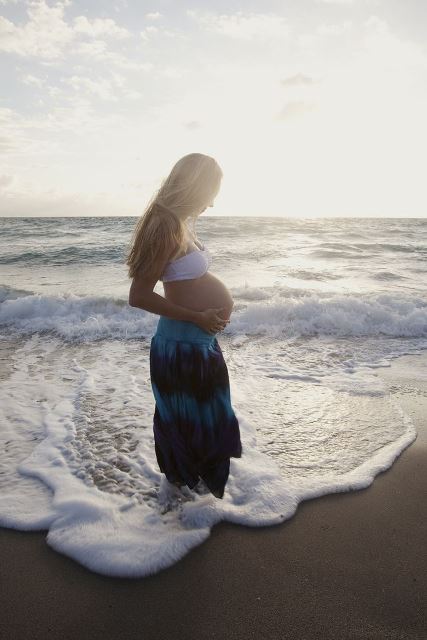 maternity bump on a seashore_New_Love_Times