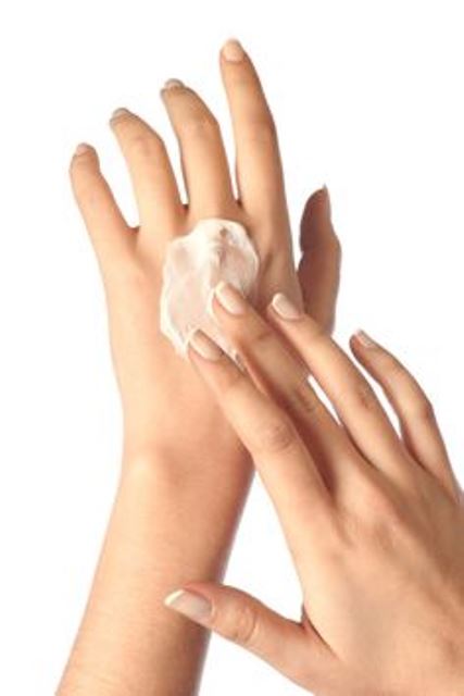 woman applying hand cream_New_Love_Times