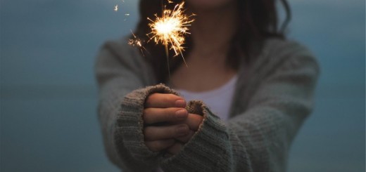 woman with a sparkler_New_Love_Times