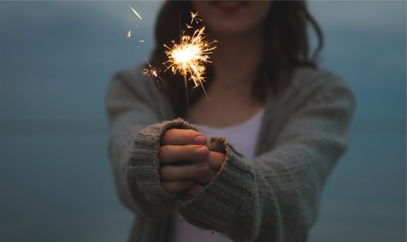 woman with a sparkler_New_Love_Times