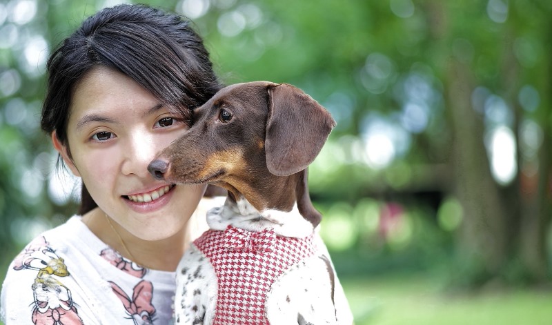 woman with her puppy_New_Love_Times