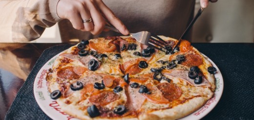 man eating pizza_New_Love_Times