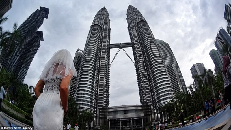 pavlina in front of the petronas towers, kuala lumpur, malaysia_New_Love_Times