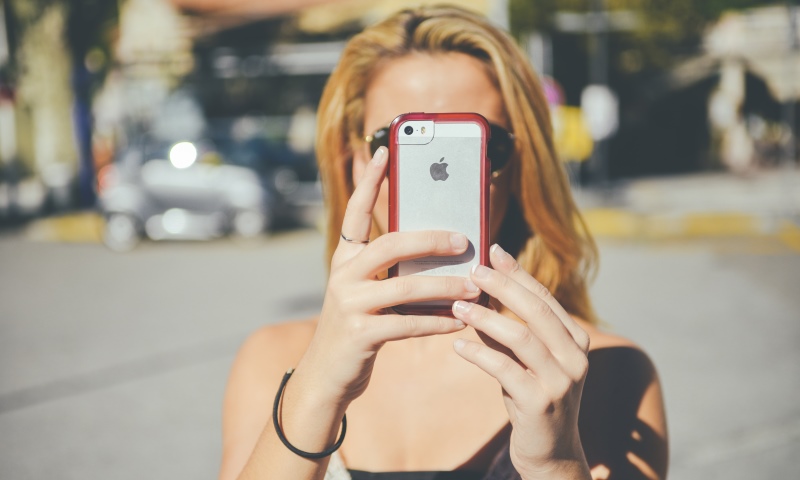 woman taking a selfie_New_Love_Times