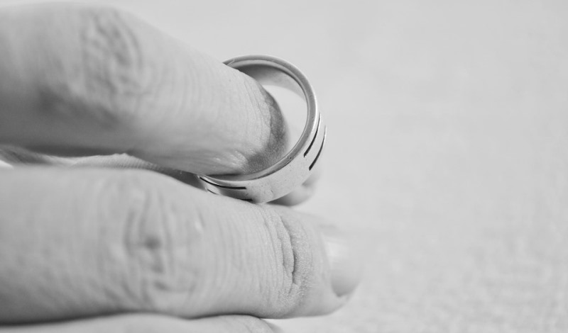 woman holding a ring_New_Love_Times