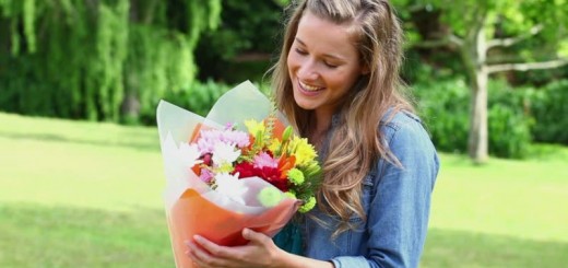 woman holding flowers_New_Love_Times