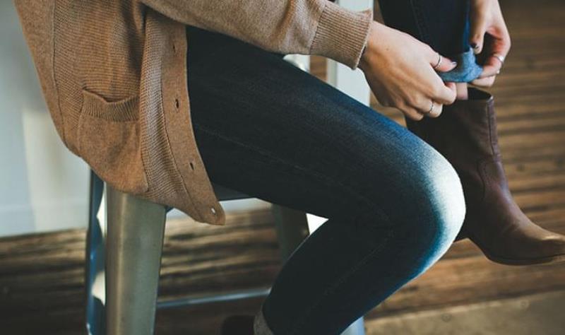 woman pulling on jeans_New_Love_Times